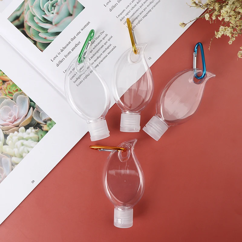 

1PC 50ml Portable Leaf Shape Empty Refillable Bottle With Key Ring Hook Travel Hand Sanitizer Bottle Hook Keychain Carrier New