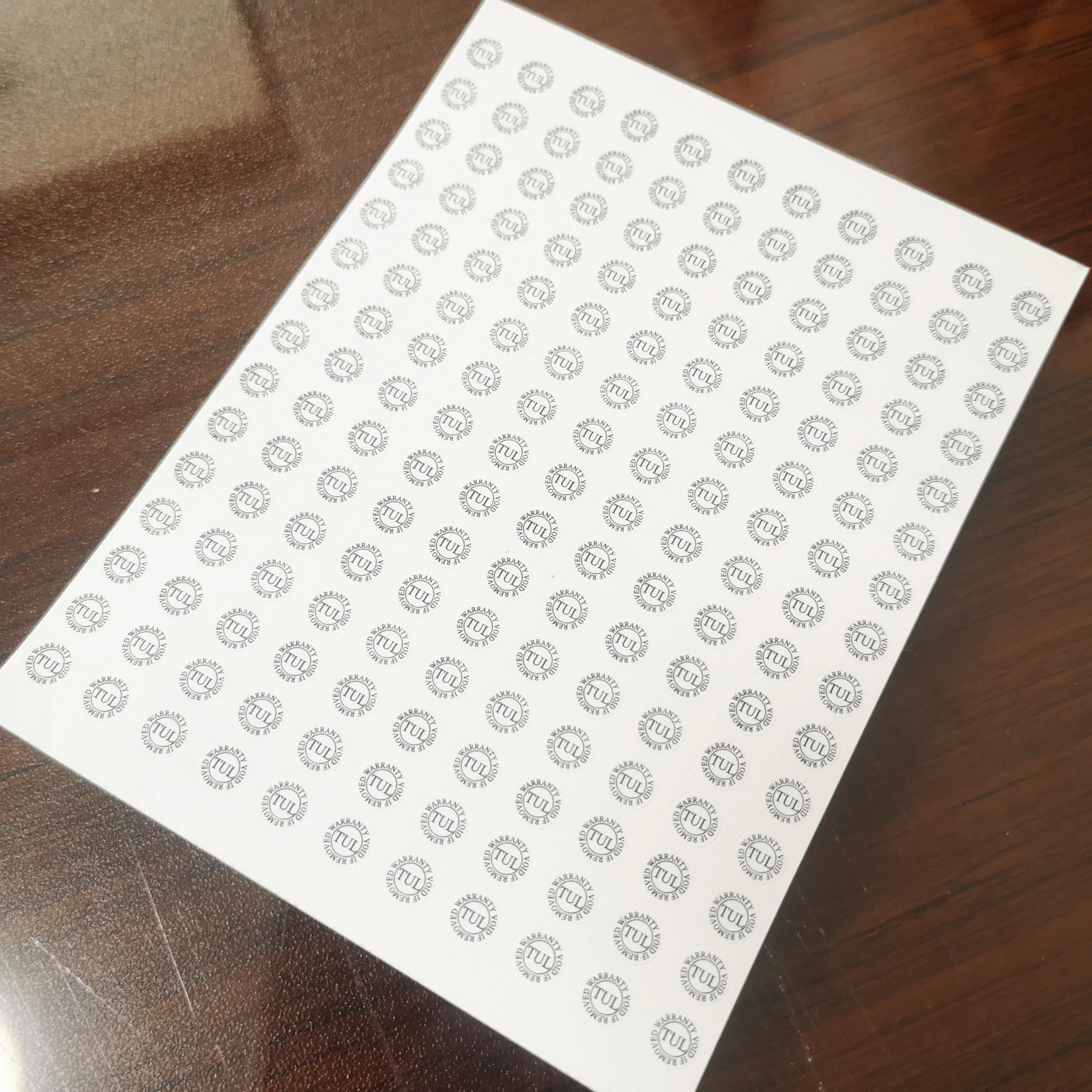 

3000 pcs of 6 mm diameter TUL WARRANTY VOID IF REMOVED tamper-evident stickers V50