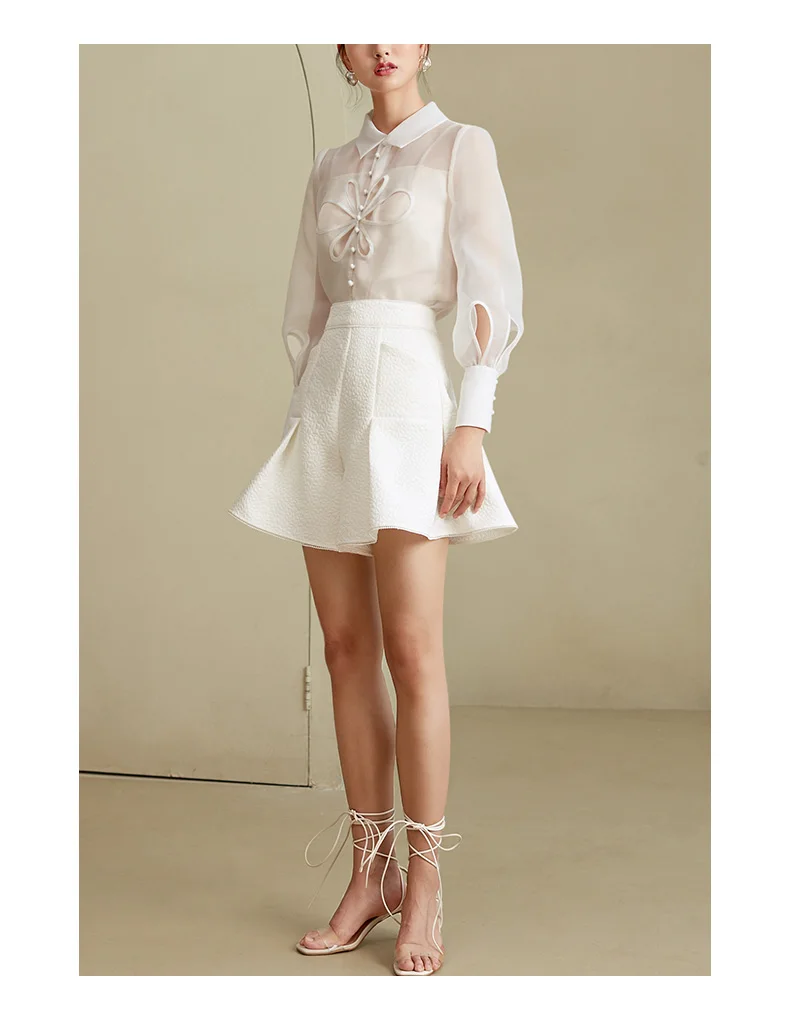 he new 2021 Spring and autumn collection features an organza shirt, slimming shorts, and age reducing suit