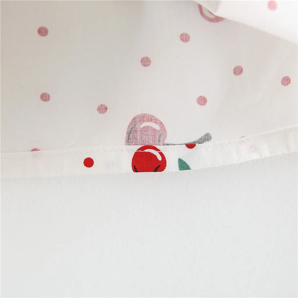 Летнее платье в горошек без рукавов с бантом