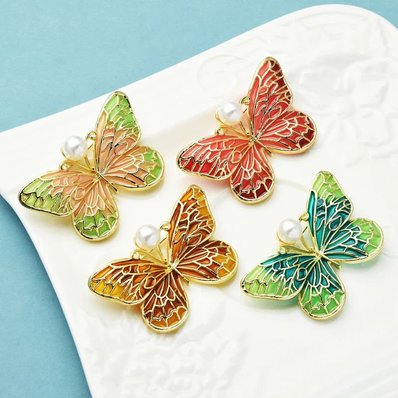 

Wuli&baby Enamel Butterfly Brooches Women Pearl 4-color Insect Shirt Dress Brooch Pins Gifts
