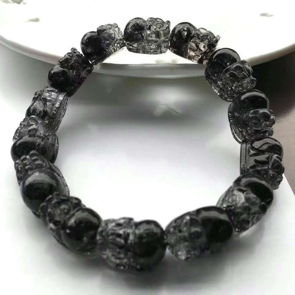 Preise Natürliche Schwarz Rutilated Quarz Kristall Armband Klar Pi Xiu Geschnitzte Perlen 15x10mm Stretch Frauen AAAAAA Zertifikat