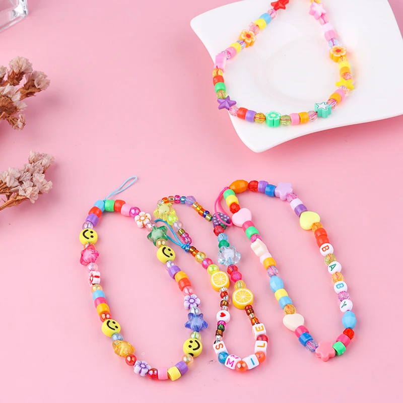 

2021 New 15.5cm Colorful Smiling Beads Mobile Phone Strap Lanyard Pearl Soft Pottery Rope Phone Chain Anti-lost Handmade Lanyard