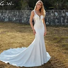 Атласное свадебное платье со шлейфом, с эффектом иллюзии