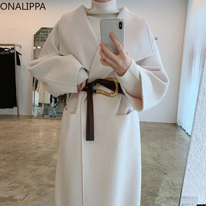 

Женское длинное шерстяное пальто Onalippa, элегантное Свободное пальто выше колена во французском стиле с большими лацканами и двумя карманами...