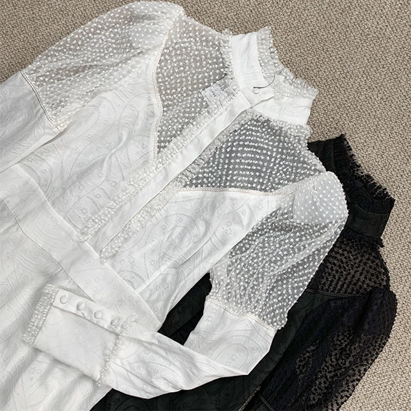 Small stand-up collar lotus leaf wave dot mesh stitching black and white two-tone waist slimming dress |