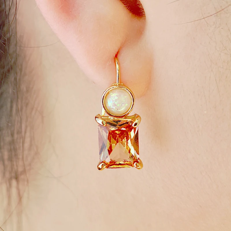 Трендовые квадратные серьги с оранжевым/шампанским цирконием женские модные