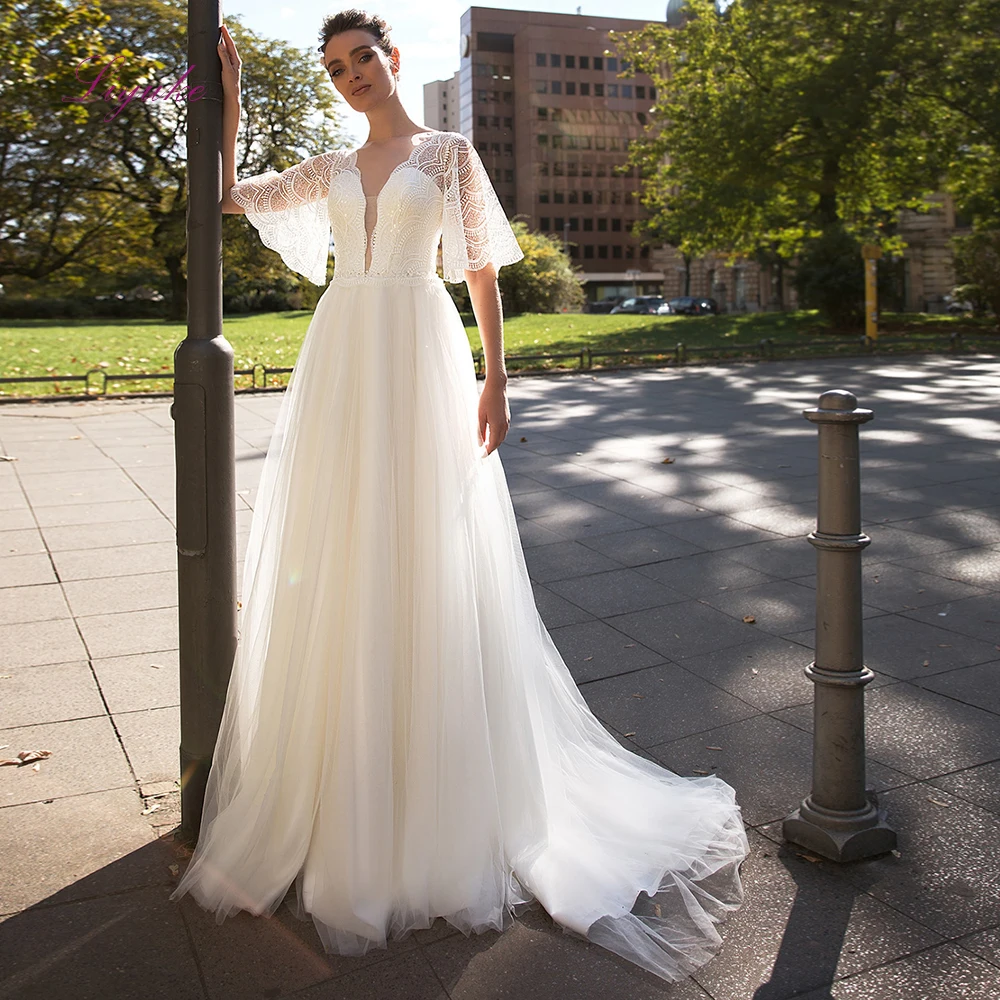 Свадебное платье трапециевидной формы Liyuke кружевное с волнистым вырезом и