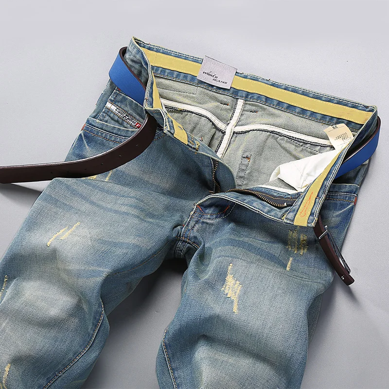 

Autumn tide brand elastic European and American wind men's jeans retro simple fashion print slim young long pants.