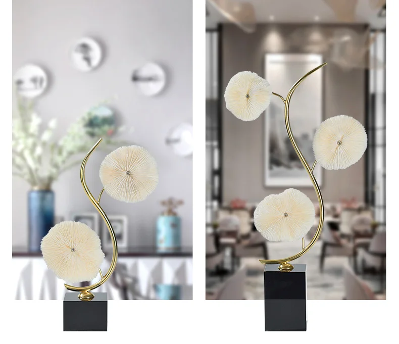 Изогнутая металлическая статуя с белыми коралловыми скульптурами современный