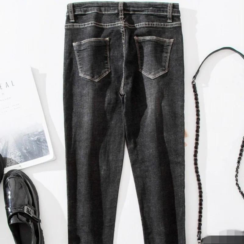 Расклешенные черные джинсы с вышивкой женские модные Стрейчевые брюки-карандаш