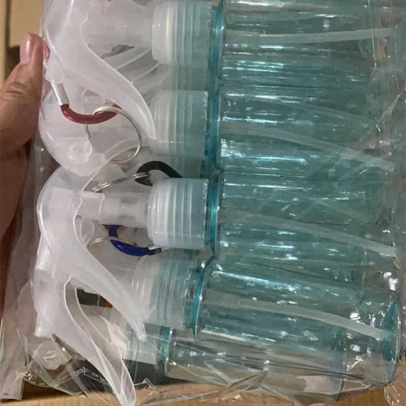 

Portable Plastic Spray Bottle Keychain Holder 60ml Empty Mist Spray Bottles for Cleaning Solutions Travel Size