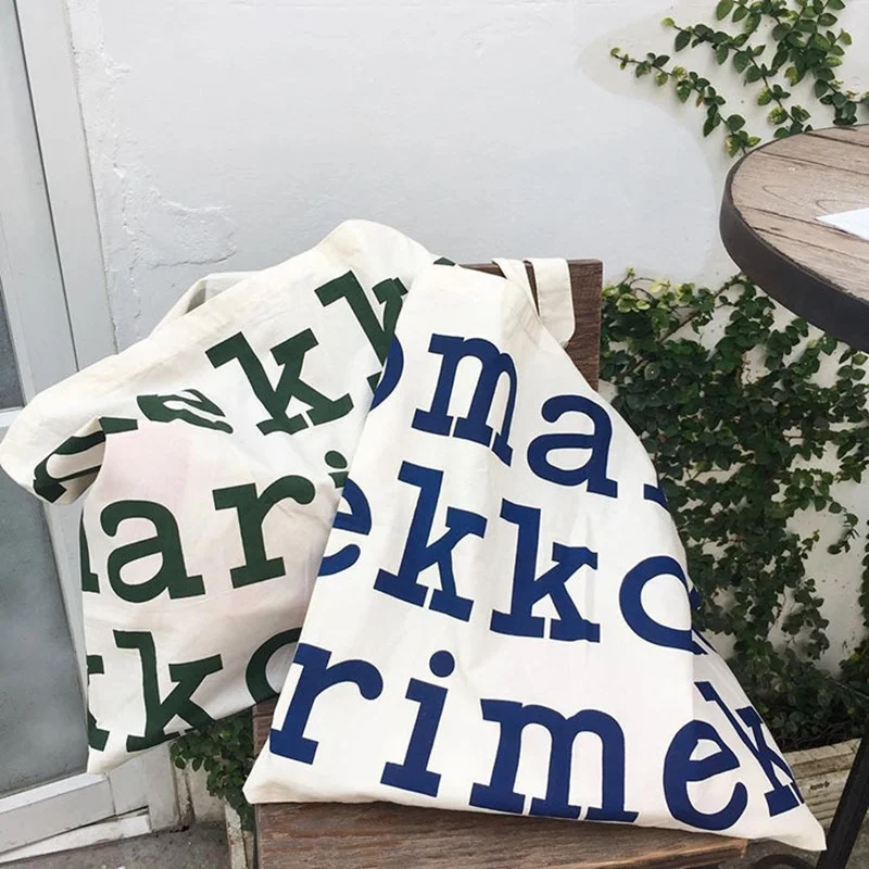 

2021 Ladies Canvas Shoulder Bags Fashion Random Letter Print Simple Style Large Capacity Reusable Handbag for Women