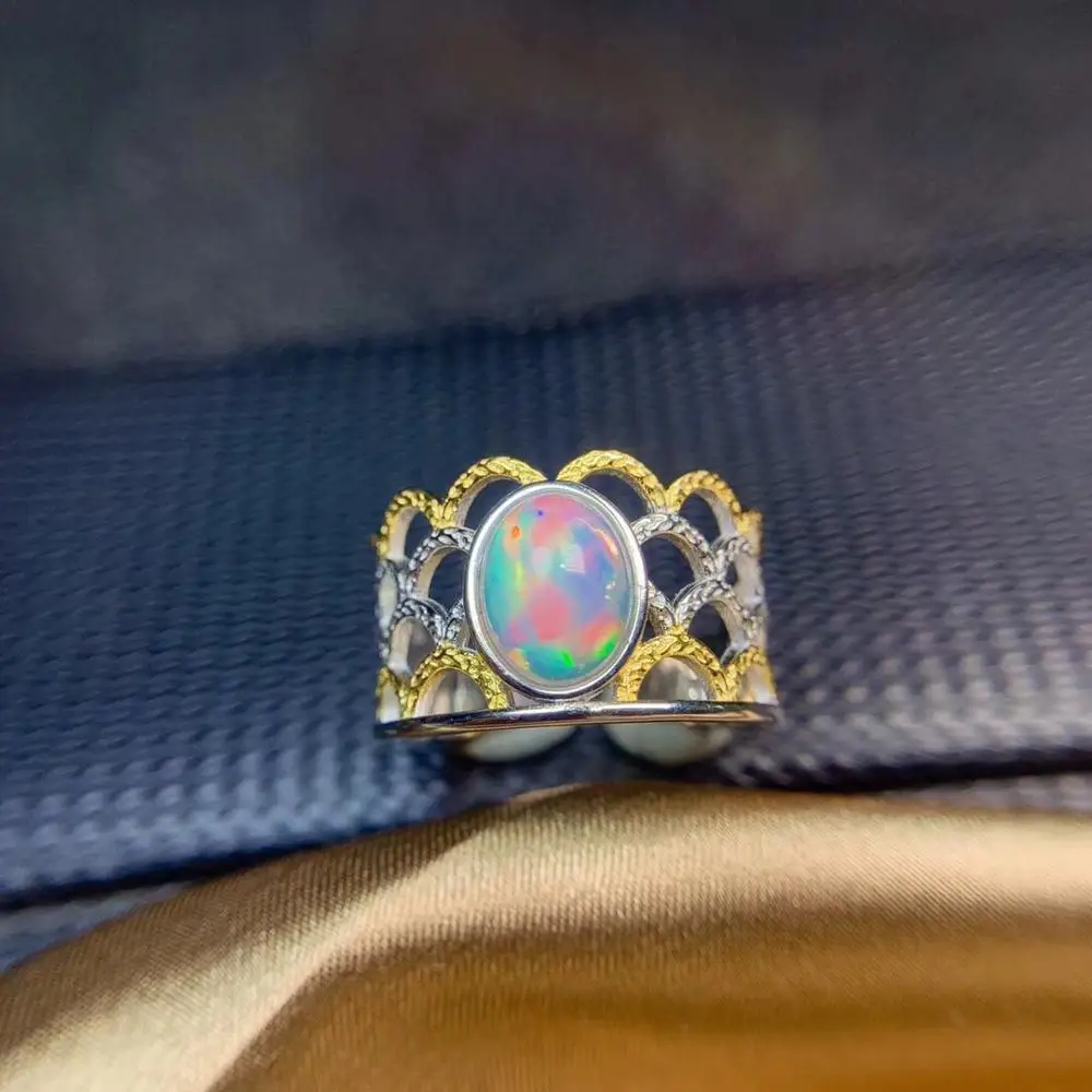 

Shop new products, recommended by the owner Natural opal woman rings change fire color mysterious 925 silver adjustable size