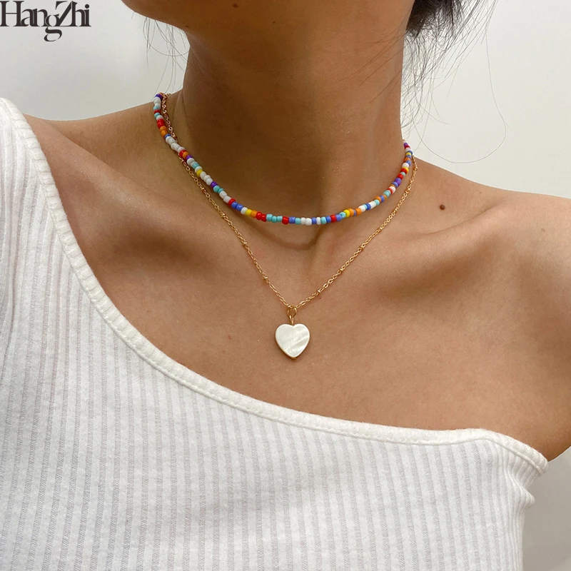 

HangZhi 2020 New 2pcs/set Rainbow Colorful Beads Necklace Geometric Heart Pendant Clavicle Choker for Women Girls Jewelry
