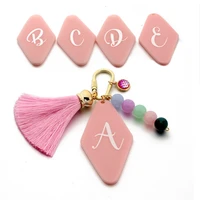 26 alphabet keychain for women tassel car keychain charms pink beads keyring for keys accessories christmas gift wholesale new