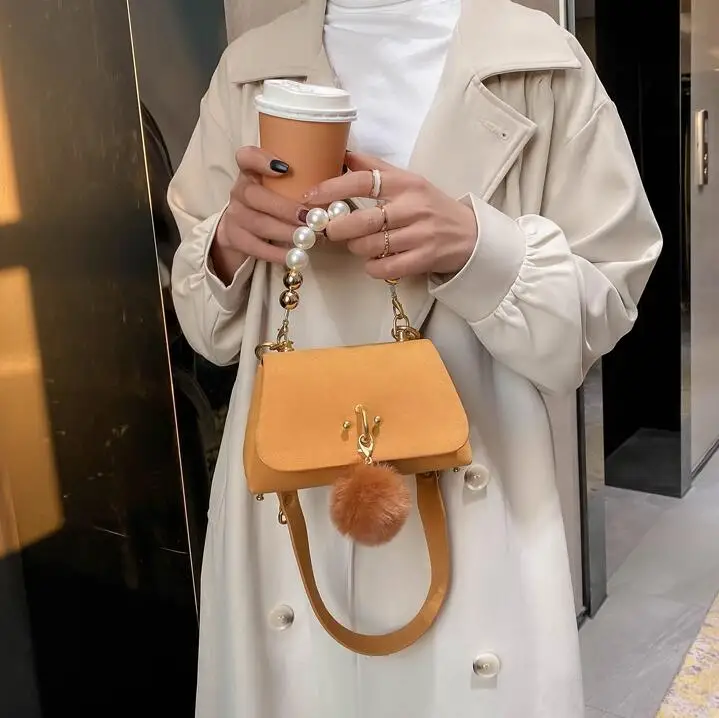 

Women Fashion Mini Pearl Handbag New High-quality Matte Soft PU Leather Luxury Designer Handbag Hairball Shoulder Messenger Bag