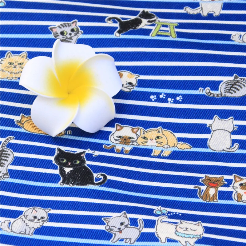 

Fine canvas lovely lines kitten cotton fabric