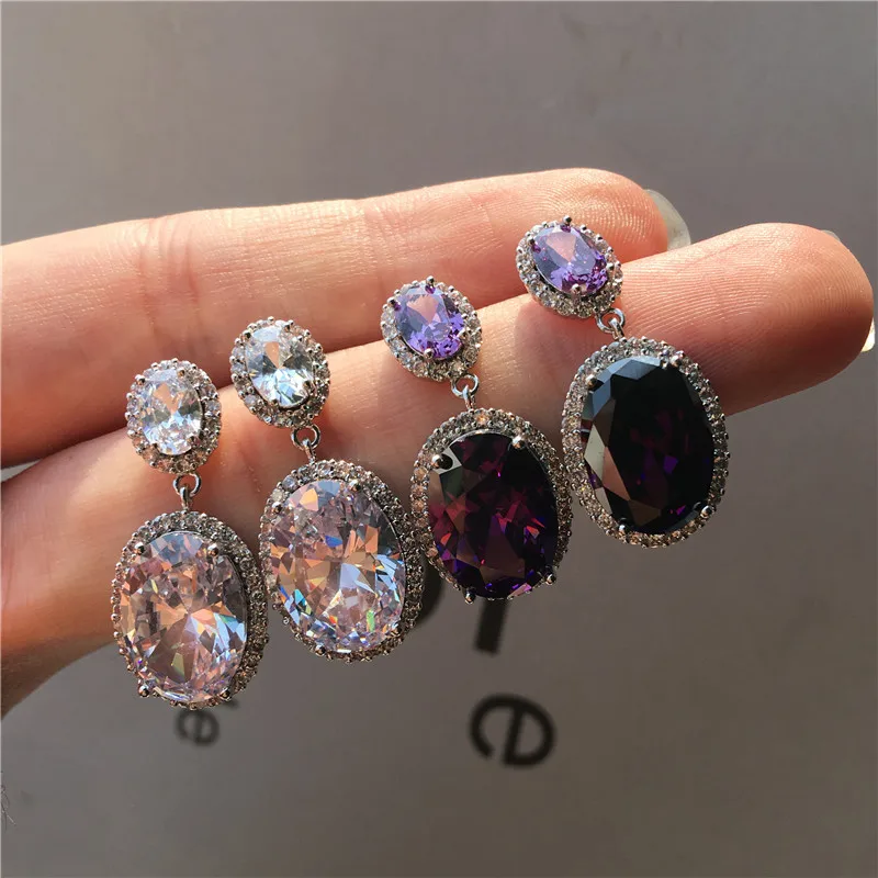 Роскошные женские серьги гвоздики серебряного цвета с крупными фиолетовыми