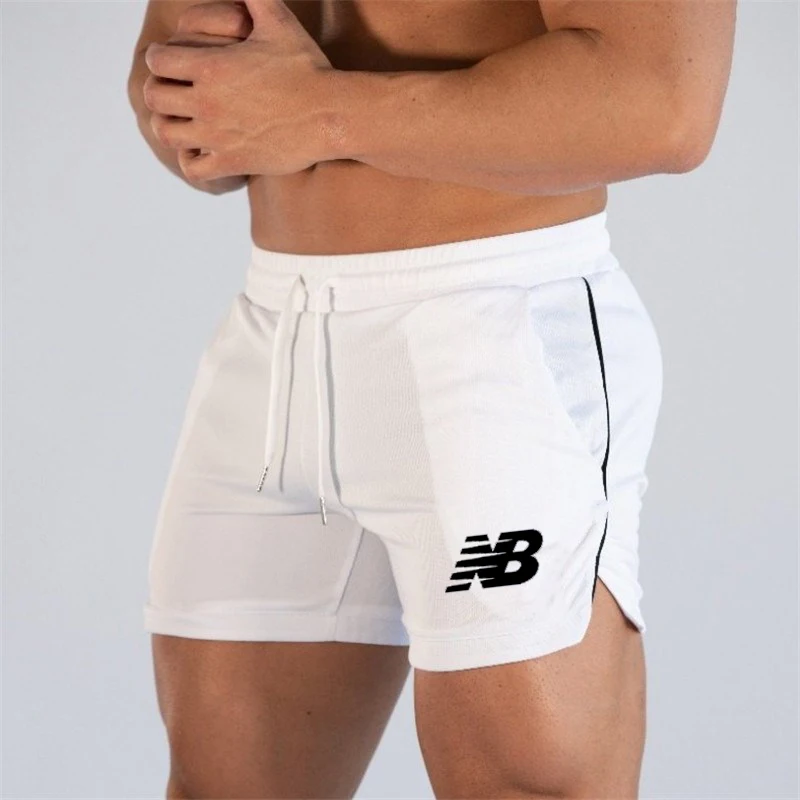 

Summer new beach sports shorts leisure fitness solid color printed men's shorts