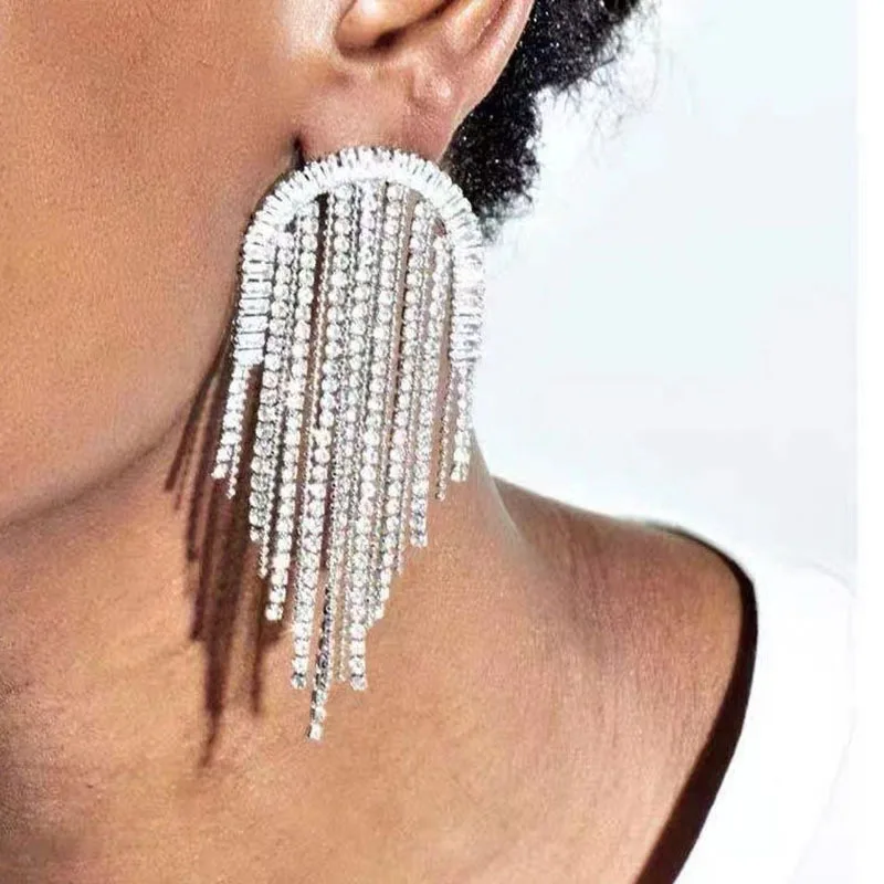 

Earrings Women's S925 Silver Needle Waterfall Gradient Elegant Personality Exaggerated Super Flash Full Diamond Star Earrings.