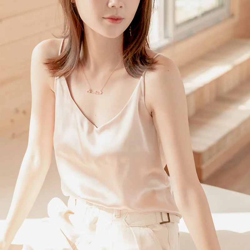 

Korean Silk Women Tops Woman V-neck Satin Blouses Top Woman Sleeveless Silk Blouse Solid Top Plus Size Blusas Mujer De Moda 2020