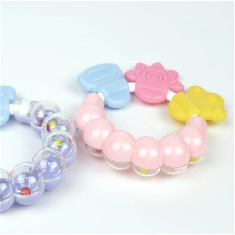 

1pcs Practical Newborn Baby Rattles Teether Toy Teeth Biting Babies Toddler Bed Bell Silicone Handbell Jingle Cartoon Teether
