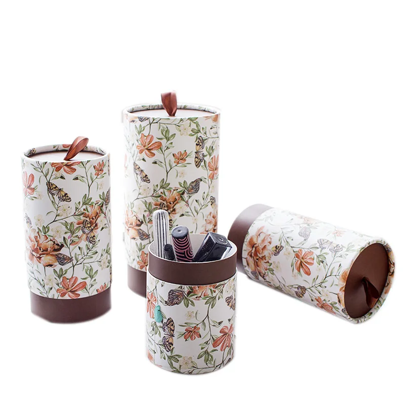 

Xin Jia Yi Packaging Paper Tube Lia Balm White Paperboard Round Shape Paper Boxes Wedding Gift Flower Paper Boxes With Handle