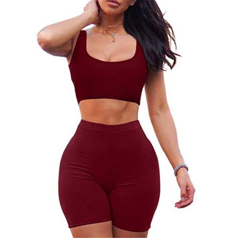 Женский комплект из двух предметов обтягивающий короткий топ и велосипедные