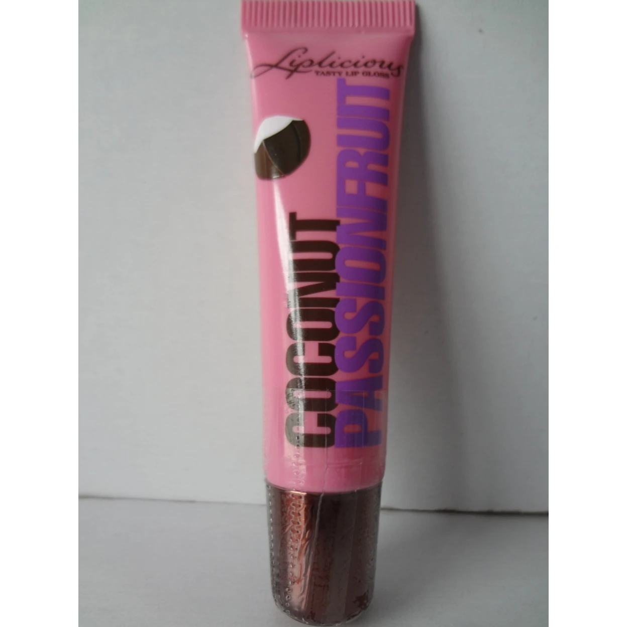 Косметика для ванны и тела Coconut Passionfruit Liplicious Tasty Lip Gloss 47 унц./14 мл| |