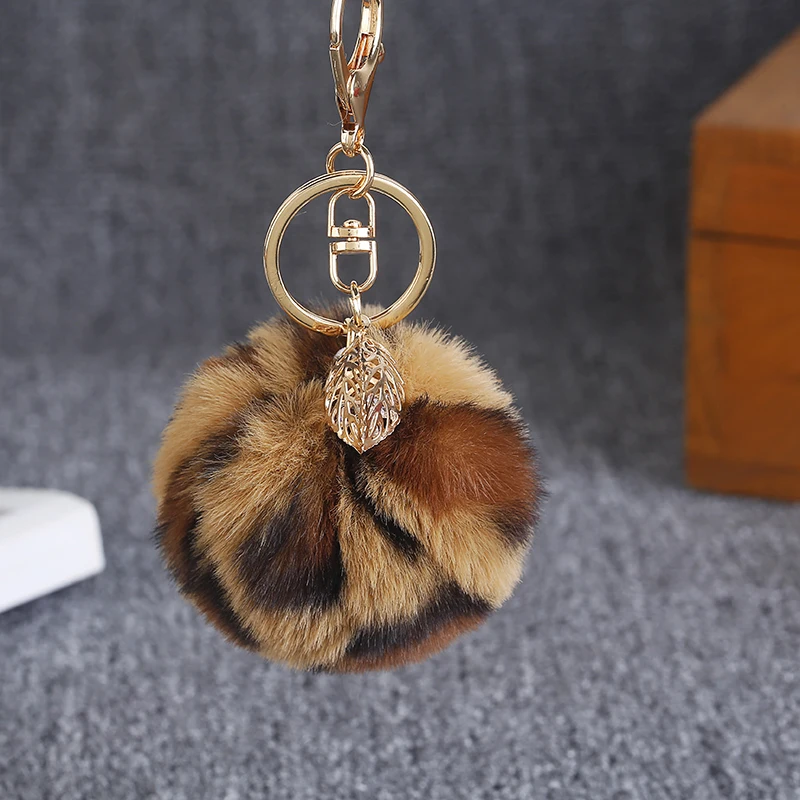 

Trinket Fluffy Artificial Fur Ball Key Chain Pompon Keychain Pompom with Leaves Animal Keychains For Woman Car Bag KeyringEH903