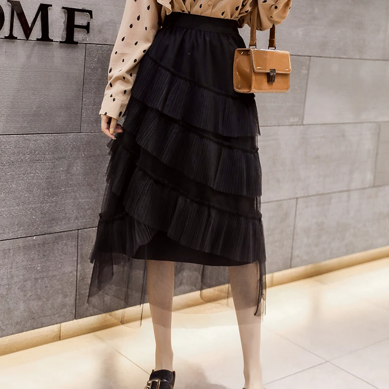 Женская сетчатая плиссированная юбка асимметричная до середины икры с