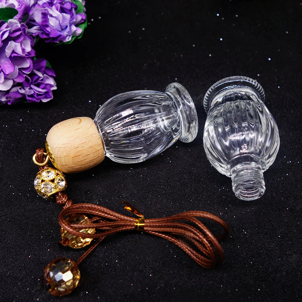 

Wholesale Car pendant 10ml mini portable glass perfume atomize containers with wood cap refillable bottles