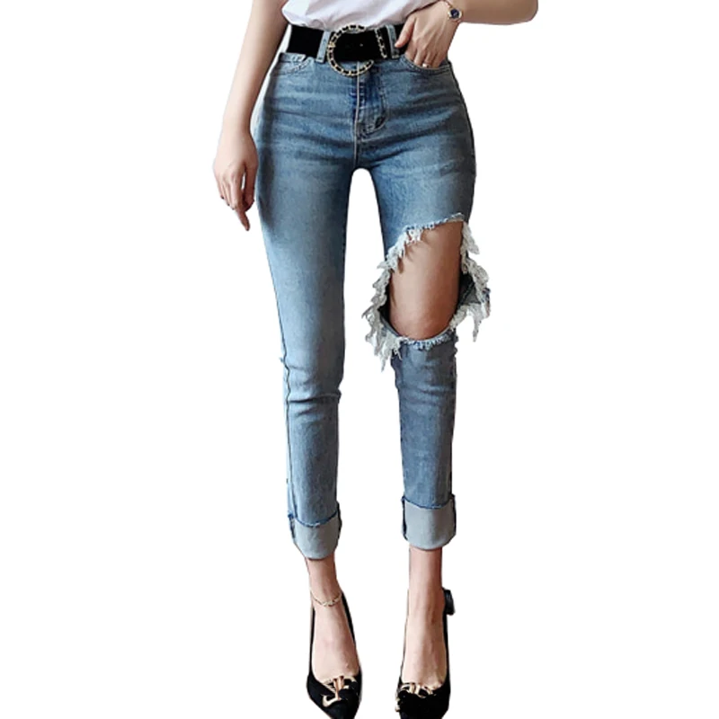 Женские эластичные джинсы с завышенной талией светло-голубые дырками на бедре 2020