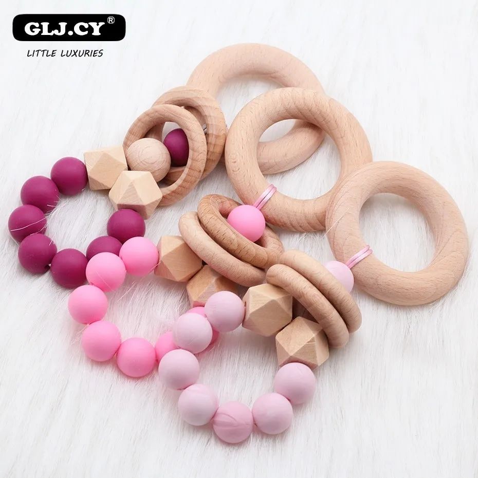 

New Baby Gift Rattle Natural Beech Wooden Toy Silicone BPA Free Teether