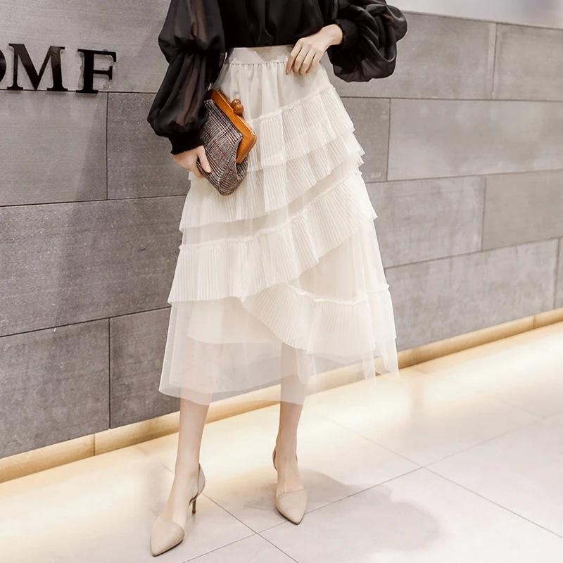 Женская сетчатая плиссированная юбка асимметричная до середины икры с