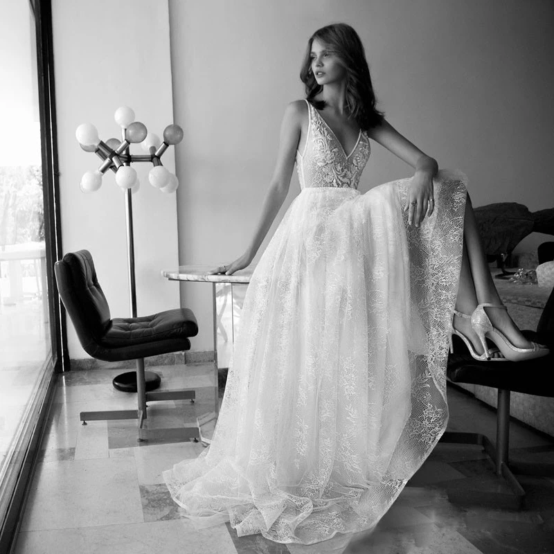 

SSYFashion New Luxury White Lace Wedding Dress The Bride Sexy V-neck Backless Lllusion Appliques Beading Long Beach Wedding Gown