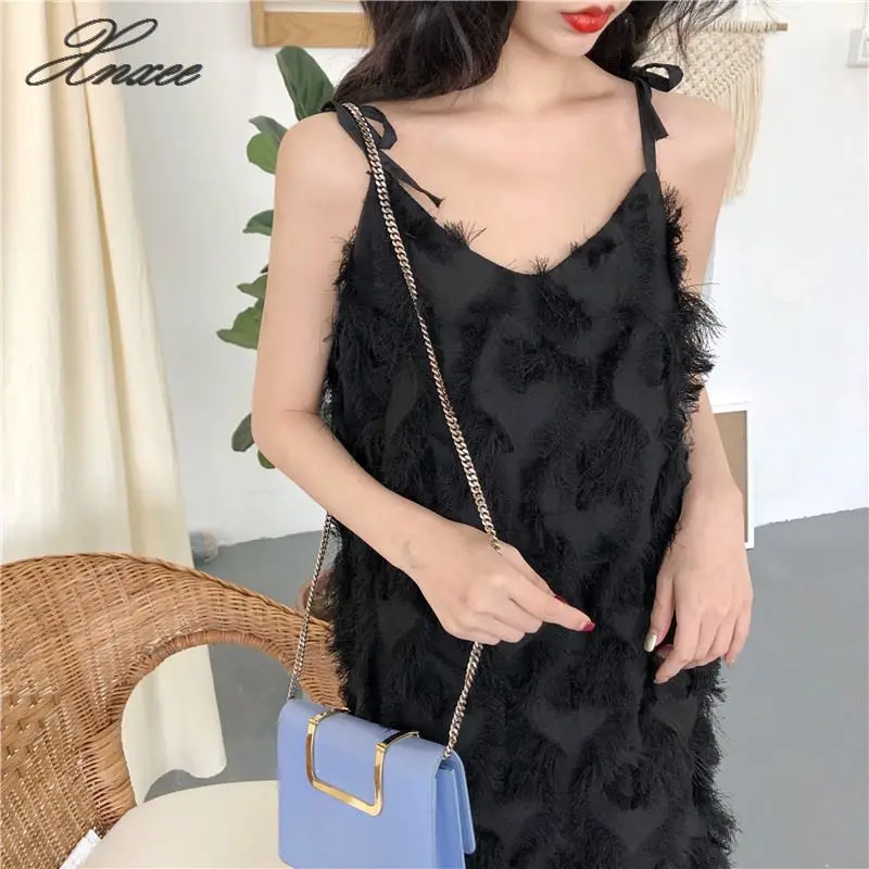 

Retro new flavor spring and summer chic feather tassel V-neck dress long irregular dress