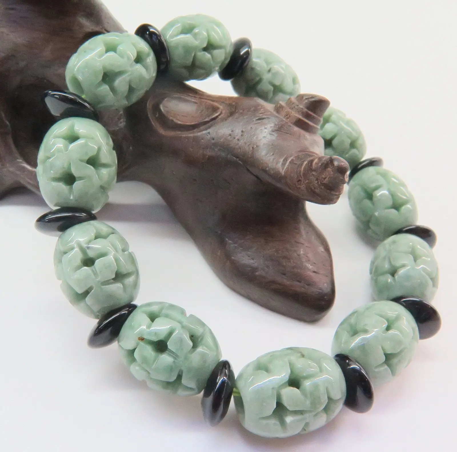 

Natural Grade A Jade (jadeite) 13mm Oil-Green Oval Bead Bracelet Authentic
