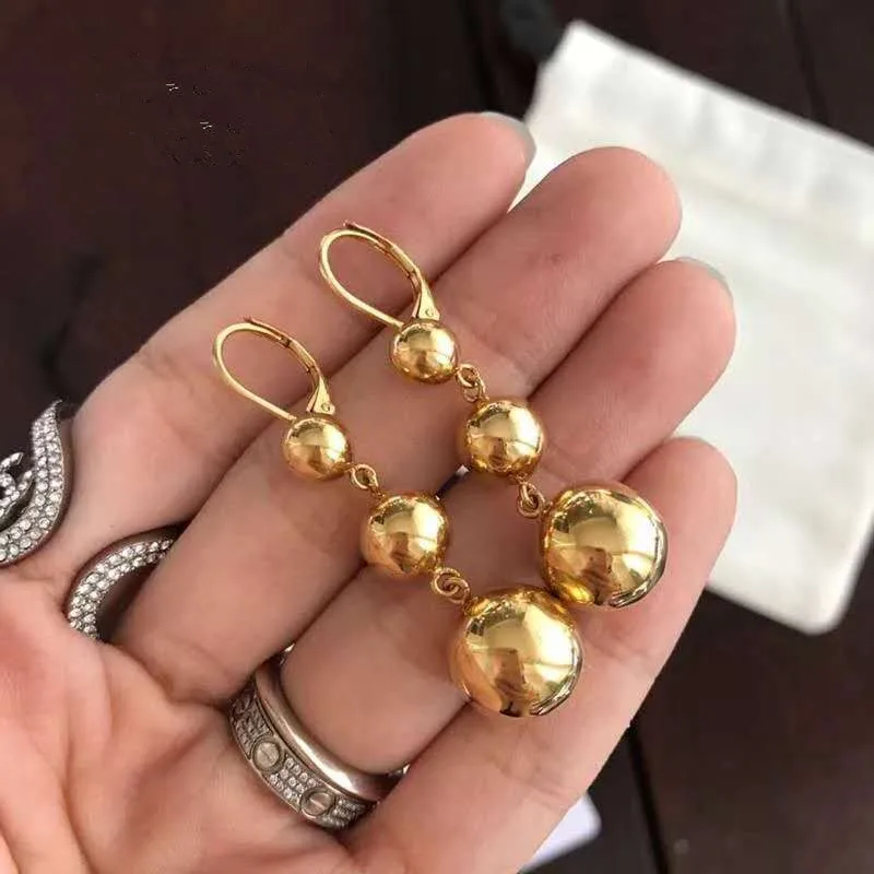

Free shipping super quality new arrivals personality 3 balls copper golden stud earrings