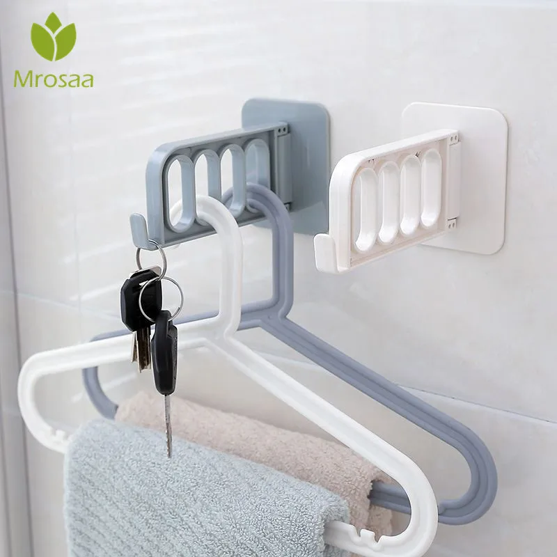 1 Pcs Mrosaa Four-hole Hanger Hooks Household Wall-mounted Punch-free Seamless Storage Rack Paste-type Magic Coat Hook Holder |
