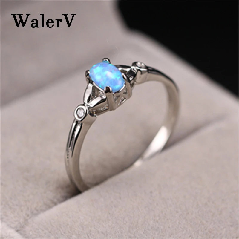 Женское кольцо WalerV овальное белого красного синего цвета с огненным опалом