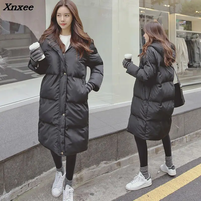 Женские пуховички длинные. Длинный пуховик. Красивые длинные женские пуховики. Пуховое пальто qwin winter. >4751026.