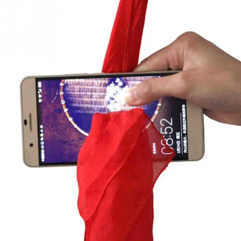 Волшебные трюки шарф через телефон крупным планом волшебство Смешные шелковые