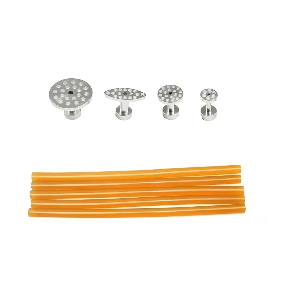 Инструменты для безопасного удаления вмятин на кузове автомобиля с помощью вакуумных присосок и ручного подъемника.