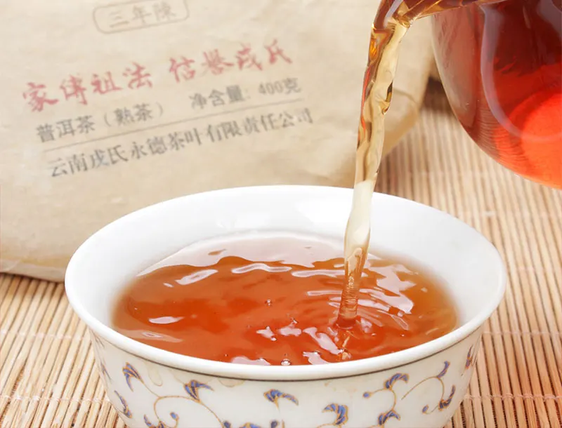 Mengku Rongshi Mu Ye Chun 3 года в возрасте спелый Pu-erh торт 400 г
