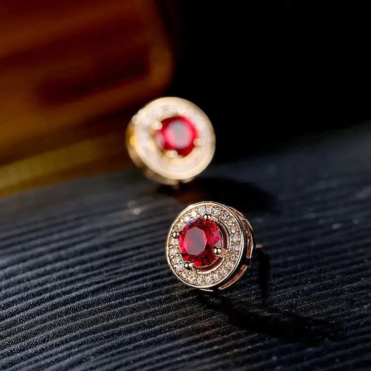 Билицветные серьги-гвоздики из розового золота с круглым цирконием Королевского