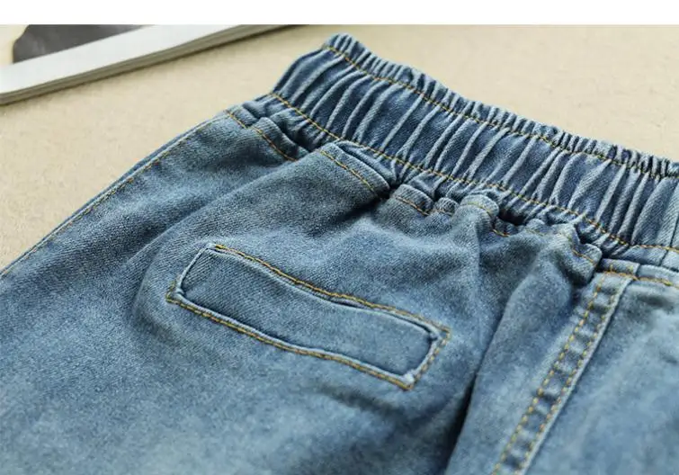 Женская летняя однобортная джинсовая юбка карандаш с высокой талией дырками