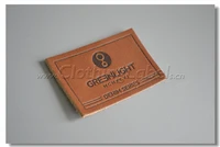 custom genuine leather label with embossed logo dark brown color