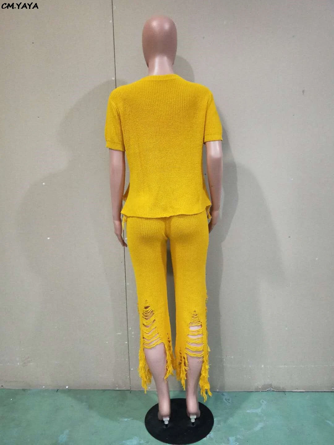 Женский трикотажный костюм из двух предметов свитер с вырезами и брюки широкими